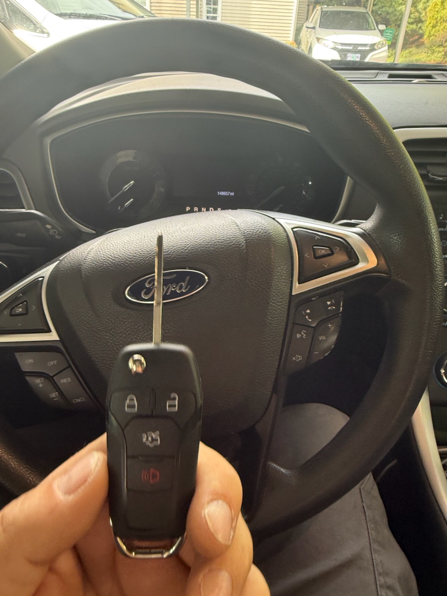 Ford Fusion (2013) — new flip key cut and programmed on-site.
