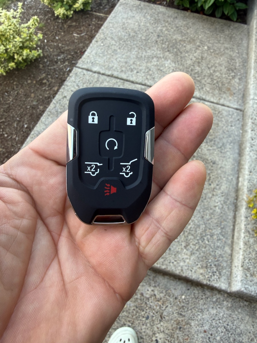 GMC smart key with remote start — one of the GM keys we program.