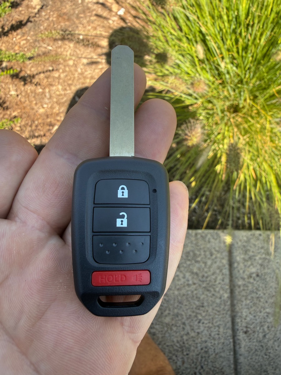 Honda remote head key — cut and programmed on-site.