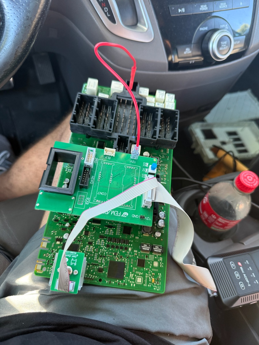 MINI Cooper (2018) — FEM module prepared on the bench with an adapter.
