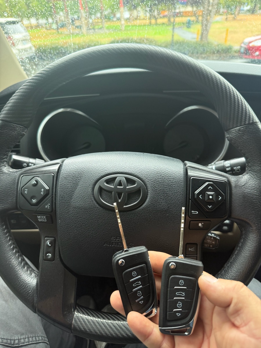 Toyota Sequoia — two flip keys programmed and tested (lock, unlock, trunk).